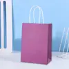 Bolsas de papel kraft de color liso, duraderas para uso diario casual, bolsas para envolver regalos navideños, bolsas para llevar de té de leche, venta al por mayor con logo personalizado