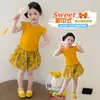 Conjunto de Verão Duas Peças para Meninas 2026 Novo Tendência Roupa Estilo Chinês para Bebê Camiseta com Manga Bufante para Meninas Calça com Estampa de Botão Floral
