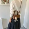 Bolsa de poá nicho super popular estilo coreano para mulheres, nova bolsa transversal versátil e estilosa 2026, bolsa de mão requintada, bolsa cilíndrica