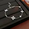 Pulsera de Flor Estrella de Circonio Electrochapada en Oro Real Pulsera Simple Versátil de Alta Gama Nicho Lujo Ligero Exquisita Joyería de Mano para Mujer
