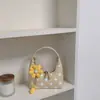 Bolso de mano de lunares dulce de moda transfronterizo, bolso de hombro y cruzado de alta gama elegante y moderno, bolso tipo albóndiga de bloqueo de color de nicho moderno