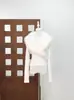 Camiseta de cuello de piel blanca estilo Spice Girls del Milenio para mujer, corte entallado, elegante diseño de nicho, manga larga, tejido ecológico de piel.