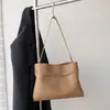 Bolso de axila Kelly retro y casual para mujer, nueva colección 2025, lujo ligero, diseño de nicho, sensación de alta gama, bolso tote cruzado para mujer