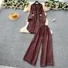 Traje de moda para mujer estilo coreano casual estilo perezoso con tiras cintura ajustada longitud media camisa con perforaciones calientes pantalones rectos de cintura alta pierna ancha