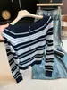 Guangzhou Thirteen Hong Artículo Caliente de Alta Calidad~Camiseta de Punto a Rayas de un Hombro Estilo Coreano con Temperamento para Mujer Manga Larga Adelgazante