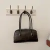 Nuevo bolso de axila de nicho para mujer, otoño de 2026, bolso tipo almohada vintage, bolso versátil de gran capacidad para el día a día, bolsos de mujer al por mayor