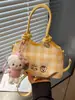 Bolso de mujer lindo de nicho súper popular 2026 nueva moda bolso cruzado versátil bolso de mano mini exquisito bolso tipo cubo