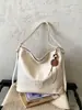 Bolso Tote de Gran Capacidad Estilo Melanoid para Mujer 2026 Nuevo Otoño Versátil para Viaje Diario Mochila Cruzada de un Solo Hombro