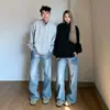 Calça jeans masculina longa, estilo americano, lavagem azul, design com efeito craquelado, tendência, casual, versátil, corte reto solto