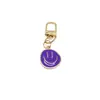 Comercio Electrónico Transfronterizo Aleación Colorido Cara Sonriente Esmaltada Llavero Chapado en Oro Expresión Asimétrica Accesorios Colgantes para Bolsos