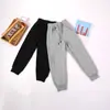 Pantalones Casuales de Moda Versátiles Cómodos Nuevos para Niños de Otoño Pantalones Largos Sueltos Pantalones Deportivos Pantalones de Estudiante Pantalones Jogger en Stock