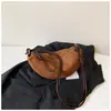Bolsa feminina estilosa de alta qualidade Shuai Mi Jia, grande capacidade, nova bolsa transversal retrô de nicho outono 2026, bolsa de bolinho