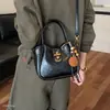 Bolso tipo cubo 2026, estilo nuevo, bandolera de moda, de un solo hombro, para el trabajo, ambiente otoñal, bolso nicho versátil para mujer