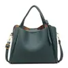 Bolso tipo cubo bandolera de cuero suave, casual y elegante, para mujer, moda verano 2025, patrón granulado, bolso de hombro único de alta gama, cruzado