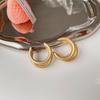 Pendientes de plata con forma de círculo de tres anillos de metal, estilo europeo y americano, con temperamento, al por mayor, estilo retro, moderno, joyería de nicho para las orejas