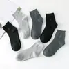 Calcetines de otoño e invierno para hombre, calcetines casuales de negocios para hombre, empaque individual, calcetines de algodón para hombre hasta la pantorrilla, calcetines absorbentes de sudor, transpirables, de color liso