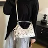 Bolsa de mão com laço de bolinhas estilo doce para mulheres, nova moda versátil de nicho para o verão, bolsa de ombro e transversal