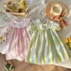 Vestido de niña con cuello Peter Pan, lazo bordado y manga corta, estilo verano 2026, rayas coloridas, dulce vestido de princesa, versión coreana