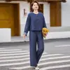 Elegante y estiloso traje de mezclilla para madres de mediana edad, nuevo traje de moda otoño 2026 para mujeres