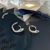 Pendientes Populares Europeos y Americanos de Serpiente con Ojos Verdes de Circonita Completa para Mujer, Pendientes de Forma de Serpiente de Lujo Ligero y Gama Alta, Pendientes Personalizados Simples al por Mayor