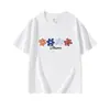 Camiseta de manga corta de algodón puro con cuello redondo de color azul oscuro para mujer, estampado floral de color contrastante de dibujos animados americanos, top holgado de verano