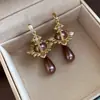 Pendientes de borla con carcasa de madera marrón transfronterizos europeos y americanos, pendientes de estilo vintage Maillard, pendientes de mujer de lujo ligero de alta gama