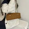 Bolso tipo baguette de gamuza retro de alta gama para el hombro 2026 nuevo clásico patrón de diamantes bolso de hombro bolso cruzado