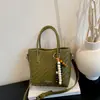 Bolso bandolera cruzado exquisito modelo nuevo 2026 versátil moda retro bolso de hombro con sensación de alta gama para uso casual en el día a día y para llevar en la mano