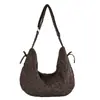Bolso de lona con estampado de leopardo para mujer, nuevo modelo otoño/invierno 2026, bolso tipo dumpling de gran capacidad para el hombro para la escuela y el trabajo, bolso de hombro y cruzado