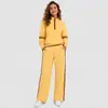 Conjunto esportivo casual popular transfronteiriço europeu e americano para mulheres, com moletom com zíper e gola semi-alta e calça longa larga solta, conjunto de duas peças