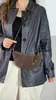 Otoño/Invierno 2026 Nuevo Bolso Croissant de Piel de Vaca Mate Bolso Dumpling de Hombro Único Cruzado Portátil Pequeño Bolso para Teléfono Móvil