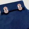 Aretes de oro de 18 quilates de Fred incrustados con diamantes con diseño de nudo doble y elegante collar con borla en forma de pera, un toque de lujo y moda