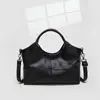 Bolsa Feminina Transfronteiriça 2026 Novo Estilo Costurada Couro Macio Grande Capacidade Fashionável Bolsa de Mãe Bolsinha de Ombro Feminina Atacado