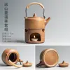 Cerámica Leña Vigas Elevadoras Hogar Cerámica Gruesa Tetera Retro Japonés Estufa Cálida para Té Cuerda Anti-Quemaduras Juego de Té Kung Fu
