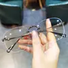 Nuevas Monturas para Gafas con Forma de Corazón Jian Dan Luo para Hombres y Mujeres, Montura de Titanio Moderna, Ultraligera, Sin Marco, Marco Perforado, Se Pueden Montar Lentes Graduados y Protección contra Luz Azul