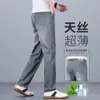 Jeans de hombre ultradelgados de Tencel, corte recto holgado, pantalones largos de seda helada, nuevo modelo de otoño, pantalones casuales elásticos de seda para hombre