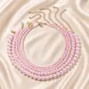 Joyería de moda transfronteriza europea y americana, elegante collar de perlas de imitación de plástico con detalles redondos, elegante y popular collar de perlas.
