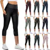Pantalones Deportivos Ajustados de Yoga Europeos y Americanos 2023 para Mujer Transfronterizos Nuevos Pantalones de Fitness Cintura Alta Acortados con Bolsillo Pantalones de Yoga