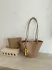 Bolsa de Axila com Textura Cruzada Bolsa de Mão Feminina 2026 Nova Bolsa de Balde Trançada Simples Bolsa Tote de Ombro Único
