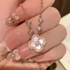 Set de Collar de Flores Rojo Dorado Exquisito Moderno Sensación de Alta Gama Lujo Ligero Nicho Celebridad de Internet Mismo Estilo Pulsera de Trébol de Cuatro Hojas para Mujer