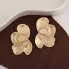 Pendientes Metálicos Exagerados de Forma Irregular de Gota de Agua Europeos y Americanos para Mujer Pendiente de Flor de Ola de Industria Pesada de Nicho Accesorio de Concha de Pulpo Venta al por Mayor
