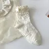 Calcetines de media caña para niños primavera y verano lolita dulce lazo color sólido encaje de burbujas calcetines de mujer viento jk lolita patrón de cáñamo