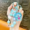 Cadena para Teléfono Llavero Oso con Forma de Corazón de Color Gelatina con Pedrería Transfronterizo Colgante para Bolso Lindo y Delicado Muñeca Máquina Regalo Pequeño
