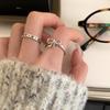 Anillo hueco con lazo irregular para mujer, estilo Ins personalizado, de moda, diseño de nicho, apertura ajustable.