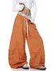 Suministro Exclusivo Transfronterizo Marca de Moda Estilo Americano Estampado de Letras Pantalones de Paracaidista Plisados tipo Cimitarra Unisex Pantalones de Pierna Ancha Sueltos para Danza Jazz