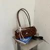 Bolso de hombro con lazo de lunares de moda transfronterizo para mujer, nuevo y elegante bolso de hombro de nicho 2026, bolso de trabajo