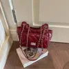 Bolsa bolsa femenina moda bolsa pequeña estilo nuevo femenina un solo hombro 2026 nicho para ir al trabajo elegante cadena versión coreana bolso cruzado