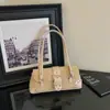 Bolso de axila de moda nuevo para mujer, bolso de mano estilo coreano patchwork vintage 2026 nicho estampado de leopardo de un solo hombro
