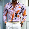 Nueva camisa de manga larga para hombre con base azul y estampado de salpicaduras naranja-amarillas, diseño audaz y llamativo, versátil para ir al trabajo
