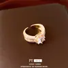 Anillo abierto redondo de circón bañado en oro real de 18k, sensación de lujo ligero de alta gama, joyería femenina moderna y versátil